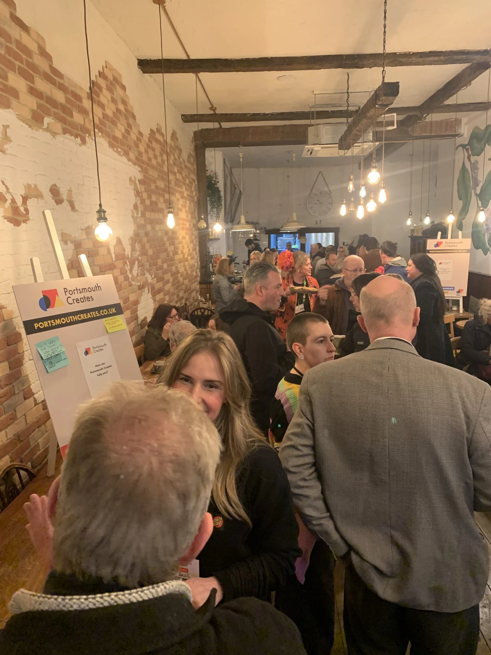 room full of people networking