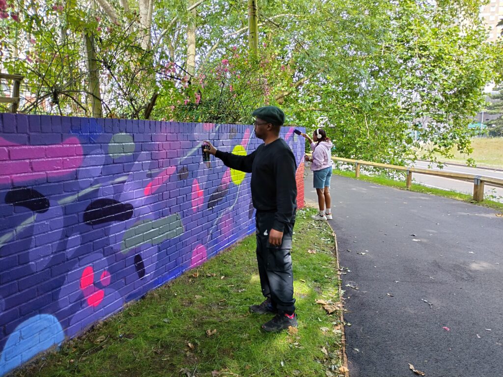 Portsmouth Creates, in collaboration with Portsmouth City Council, is proud to unveil a new street art mural, a vibrant addition to the improved walking and cycling route in Southsea.